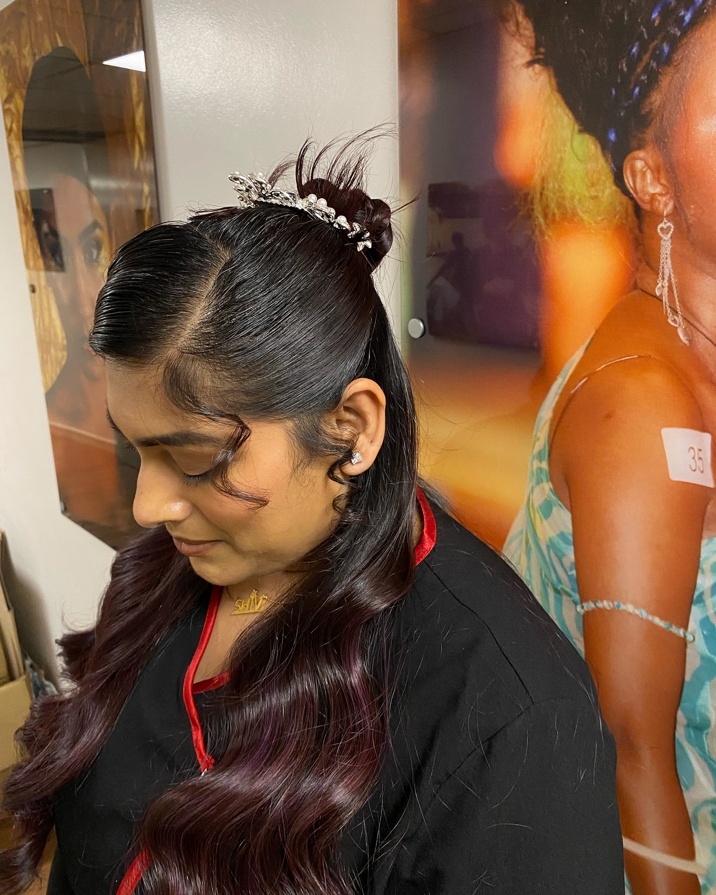 Half-up half-down occasion hairstyle with deep burgundy colour by Hair by Sham, Leicester