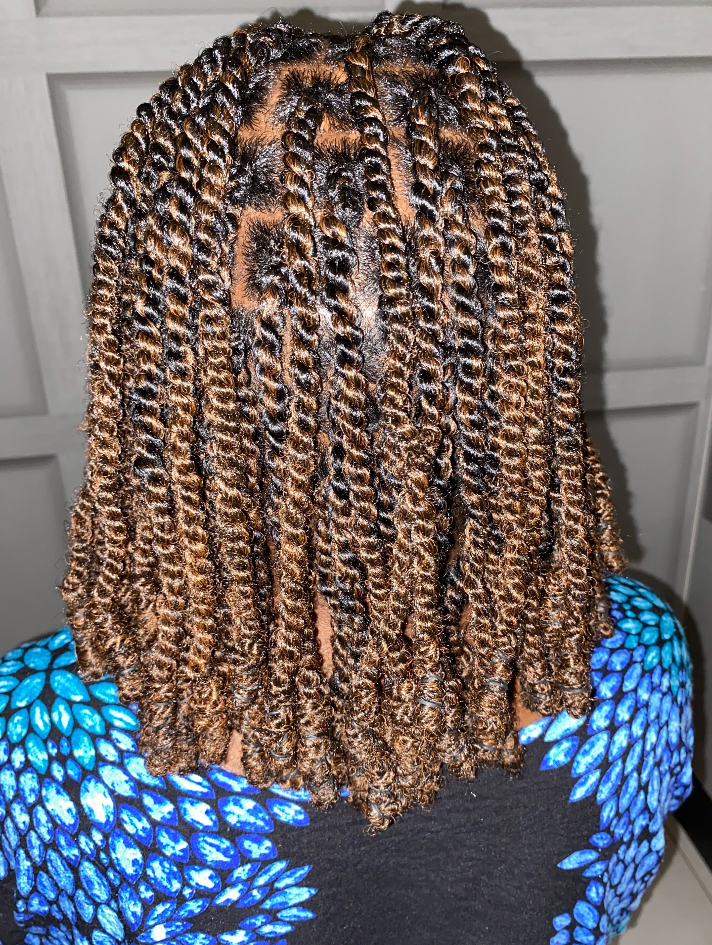 Two-strand twists with black and honey brown ombre by Hair by Sham, Leicester